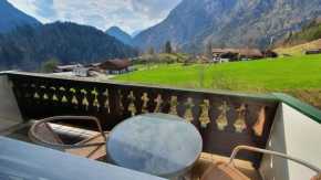 Ferienwohnung mit Terrasse und Bergblick